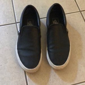Perforated black leather vans slip ons